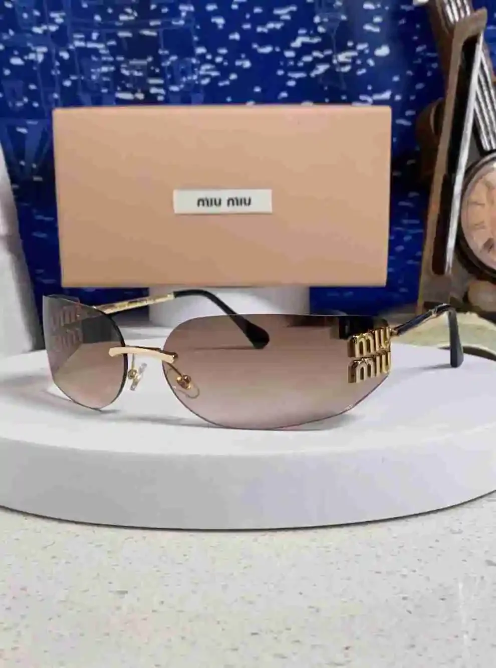 Miu Miu Rimless Gradient Brown Lens Gold Logo Sunglasses